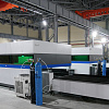 FL-L1560FHE-10000-IPG Лазерный станок для резки листового металла с кабинетной защитой и сменным столом